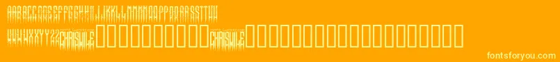 XspikedRegular-Schriftart – Gelbe Schriften auf orangefarbenem Hintergrund