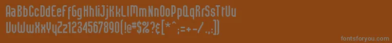 Czcionka Beastvs – szare czcionki na brązowym tle