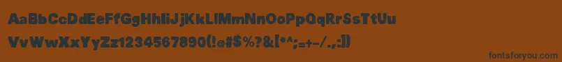 フォントMtfChubb – 黒い文字が茶色の背景にあります