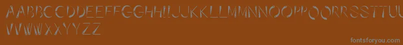 フォントAffixed – 茶色の背景に灰色の文字