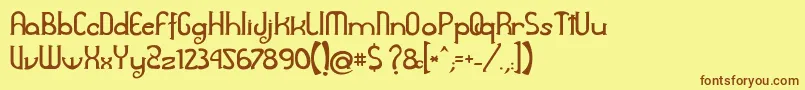 フォントAwelita – 茶色の文字が黄色の背景にあります。