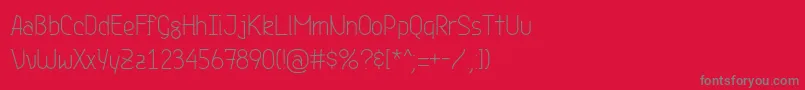フォントGenji – 赤い背景に灰色の文字