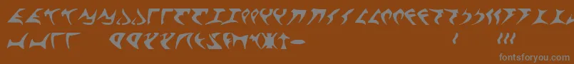 KlingonFont-fontti – harmaat kirjasimet ruskealla taustalla