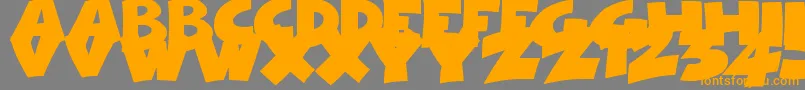 フォントComicalCartoon – オレンジの文字は灰色の背景にあります。