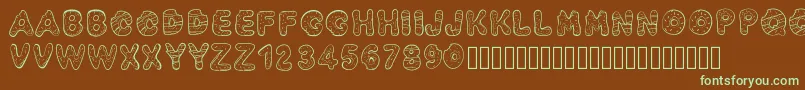 Pwyummydonuts-fontti – vihreät fontit ruskealla taustalla