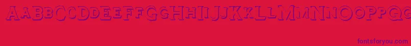 Tinplatetitlingshadowed Font – Purple Fonts on Red Background