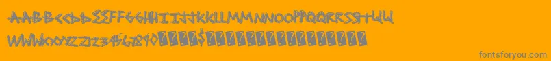 Shocktreatment-Schriftart – Graue Schriften auf orangefarbenem Hintergrund