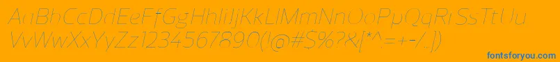 fuente ReganUltralightitalic – Fuentes Azules Sobre Fondo Naranja
