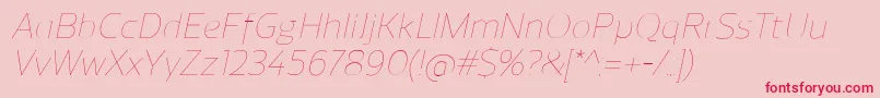 ReganUltralightitalic-fontti – punaiset fontit vaaleanpunaisella taustalla