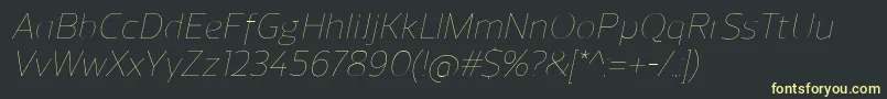ReganUltralightitalic Font – Yellow Fonts on Black Background
