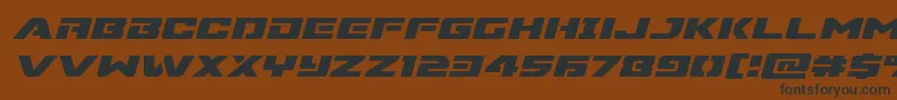 フォントSupercommandoexpandital – 黒い文字が茶色の背景にあります