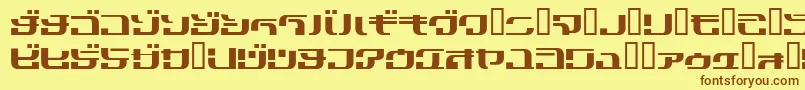 フォントCobra3Kn – 茶色の文字が黄色の背景にあります。