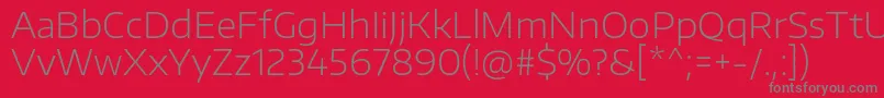 Czcionka EncodesanswideExtralight – szare czcionki na czerwonym tle