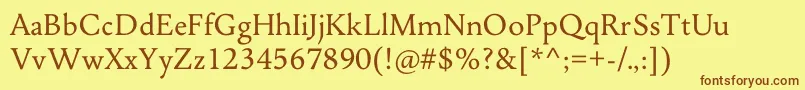 フォントJenrivRegularDonationware – 茶色の文字が黄色の背景にあります。