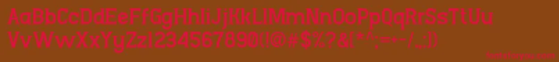 NgopidokenRegular Font – Red Fonts on Brown Background