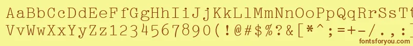 フォントPica10PitchBt – 茶色の文字が黄色の背景にあります。