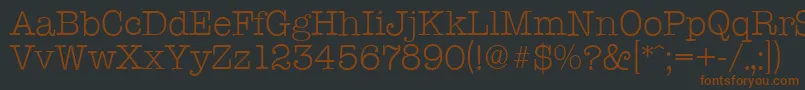 Czcionka TypewriterserialLightRegular – brązowe czcionki na czarnym tle