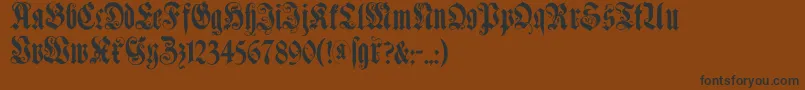Muenchnerfraktur-Schriftart – Schwarze Schriften auf braunem Hintergrund