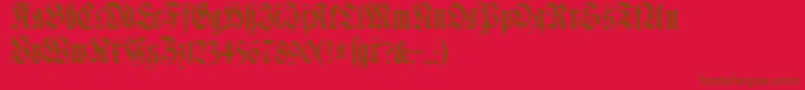 Muenchnerfraktur-Schriftart – Braune Schriften auf rotem Hintergrund