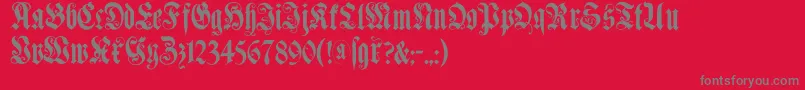 フォントMuenchnerfraktur – 赤い背景に灰色の文字