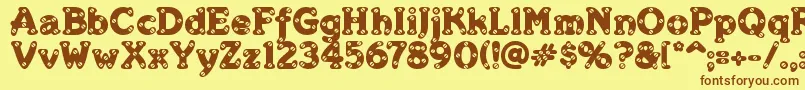 MerkinSkroo Font – Brown Fonts on Yellow Background