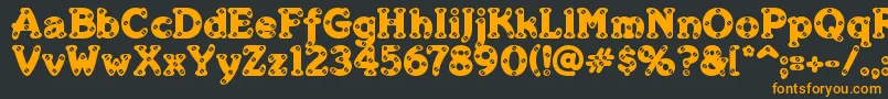 MerkinSkroo Font – Orange Fonts on Black Background