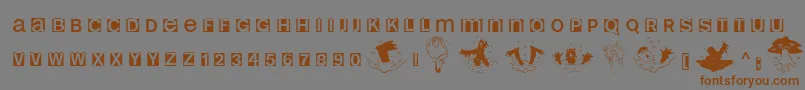 フォントHelloweenia – 茶色の文字が灰色の背景にあります。