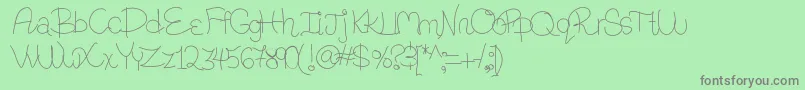 Ranaqatarii Font – Gray Fonts on Green Background