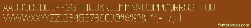 フォントOctinstencilltRegular – 緑色の文字が茶色の背景にあります。
