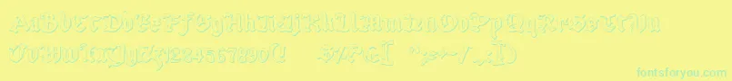 UberhГ¶lmeOutline Font – Green Fonts on Yellow Background