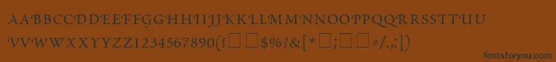 fuente ScriptoriaSmallCapsSsi – Fuentes Negras Sobre Fondo Marrón