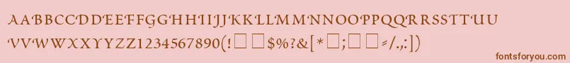フォントScriptoriaSmallCapsSsi – ピンクの背景に茶色のフォント