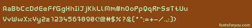 フォントWebpixelBitmapBold – 緑色の文字が茶色の背景にあります。
