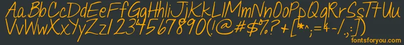 Jandaquicknote Font – Orange Fonts on Black Background