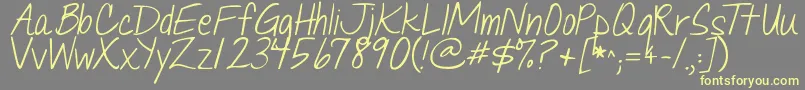 Jandaquicknote Font – Yellow Fonts on Gray Background