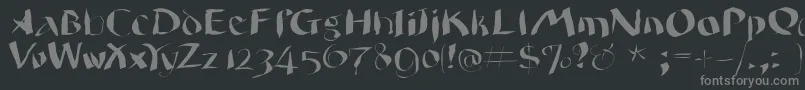 Wildquill-Schriftart – Graue Schriften auf schwarzem Hintergrund