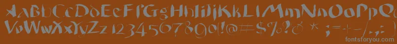 Wildquill-Schriftart – Graue Schriften auf braunem Hintergrund