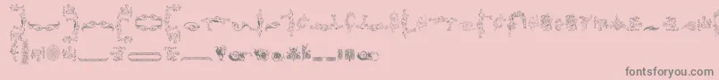 Ornamentamonumenta-Schriftart – Graue Schriften auf rosa Hintergrund