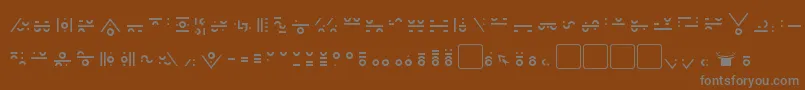フォントGiediMaximal – 茶色の背景に灰色の文字