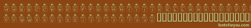 PfSnowman2フォントについての詳細 フォントPfSnowman2 – 緑色の文字が茶色の背景にあります。