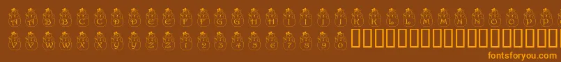 PfSnowman2 Font – Orange Fonts on Brown Background