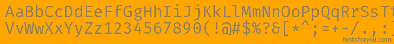 Czcionka FiramonoRegular – szare czcionki na pomarańczowym tle