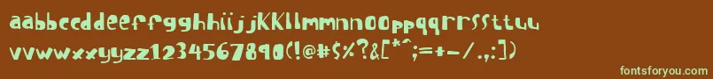 フォントSuckgolf – 緑色の文字が茶色の背景にあります。