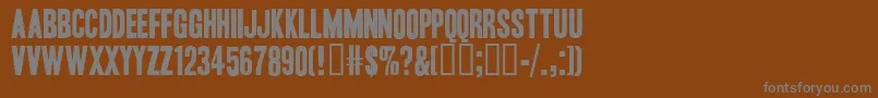 フォントHeadlineOneHplhs – 茶色の背景に灰色の文字