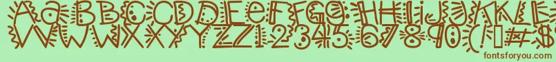 Шрифт Manicpopthrill – коричневые шрифты на зелёном фоне