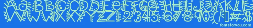 Manicpopthrill Font – Green Fonts on Blue Background