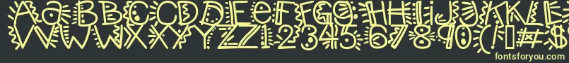 Manicpopthrill Font – Yellow Fonts on Black Background