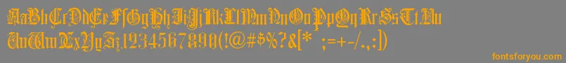 フォントColchesterBlack – オレンジの文字は灰色の背景にあります。