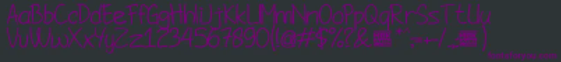 JombloNgenes Font – Purple Fonts on Black Background