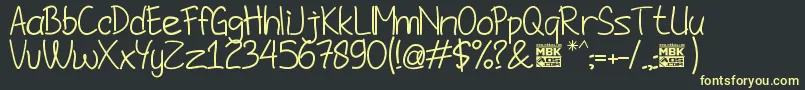 JombloNgenes Font – Yellow Fonts on Black Background